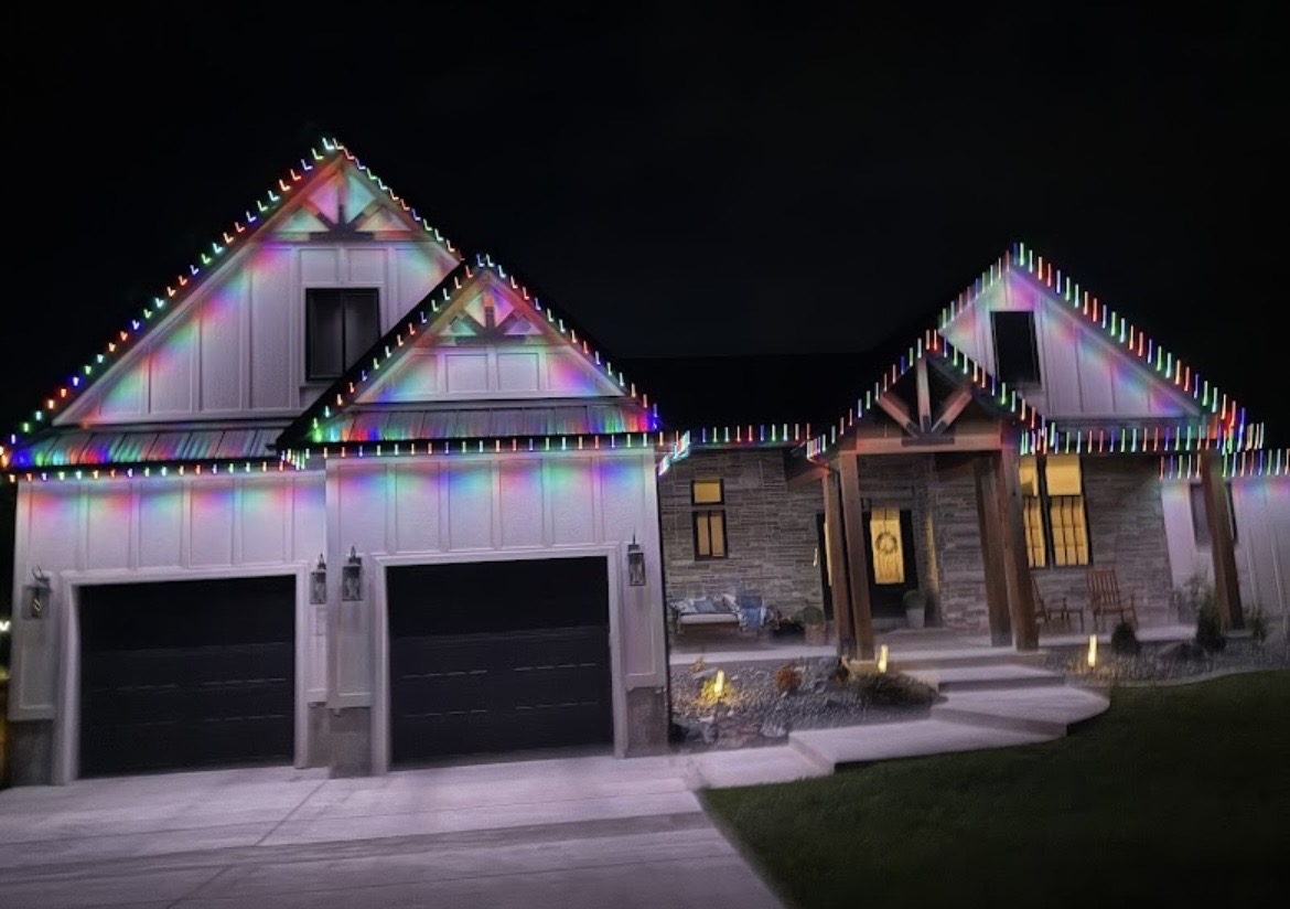 Large home outlined in multicolor permanent LEDs